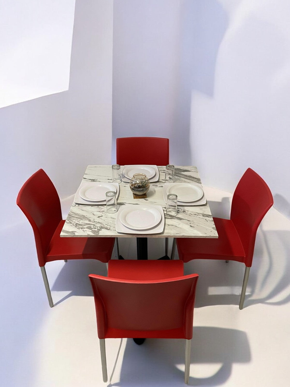 Mesa para restaurante Melanove con sillas Ocean