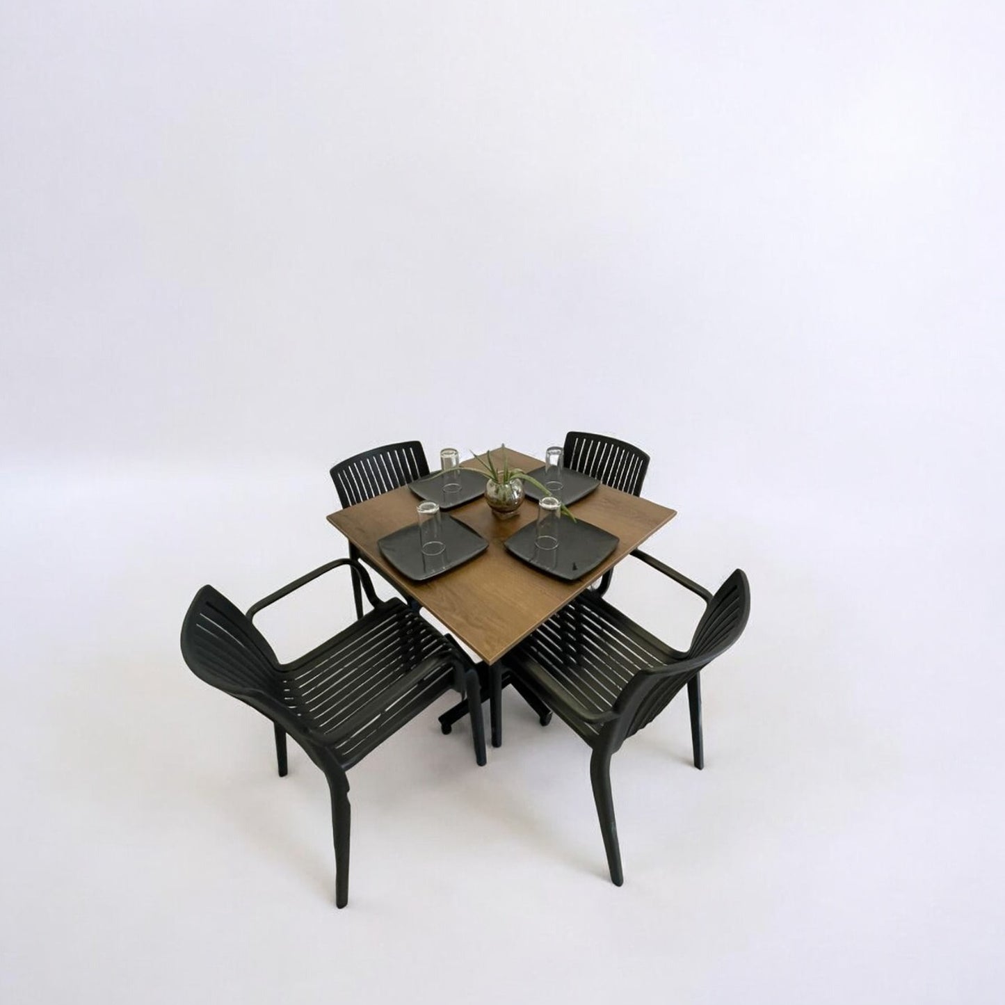 Mesa para restaurante Melanove con sillas Milos