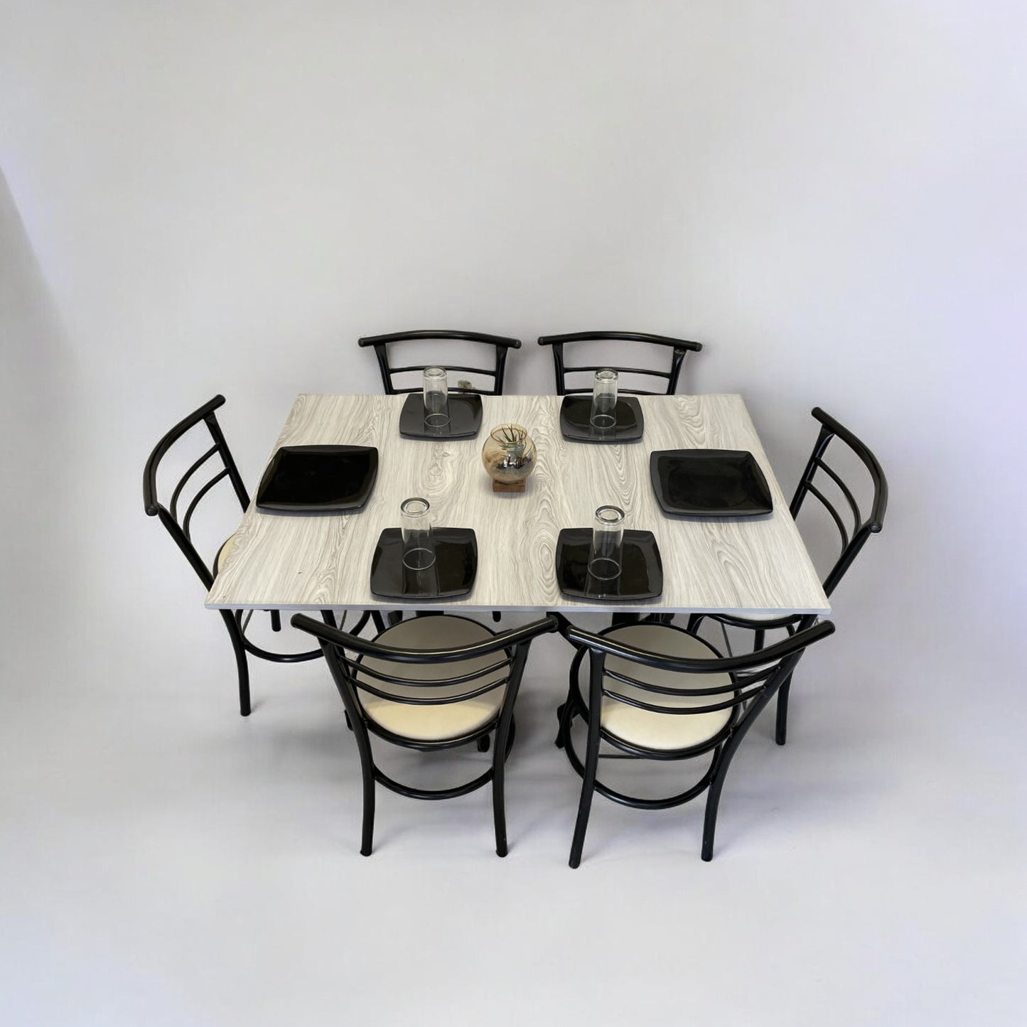 Mesa para restaurante Melanove con sillas Chabely