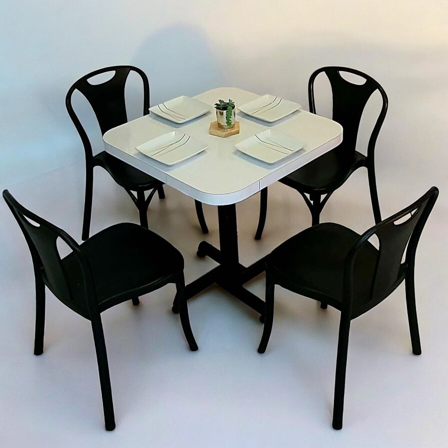 Mesa para restaurante Formaica con sillas Sara