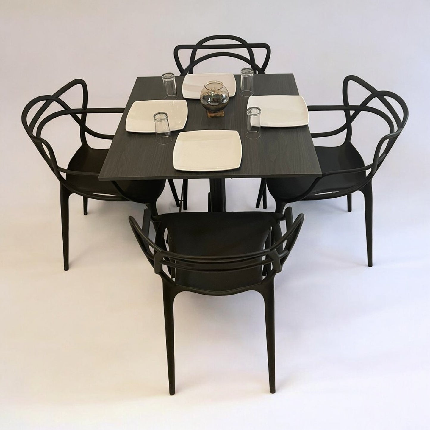 Mesa para restaurante Melanove con sillas Trix