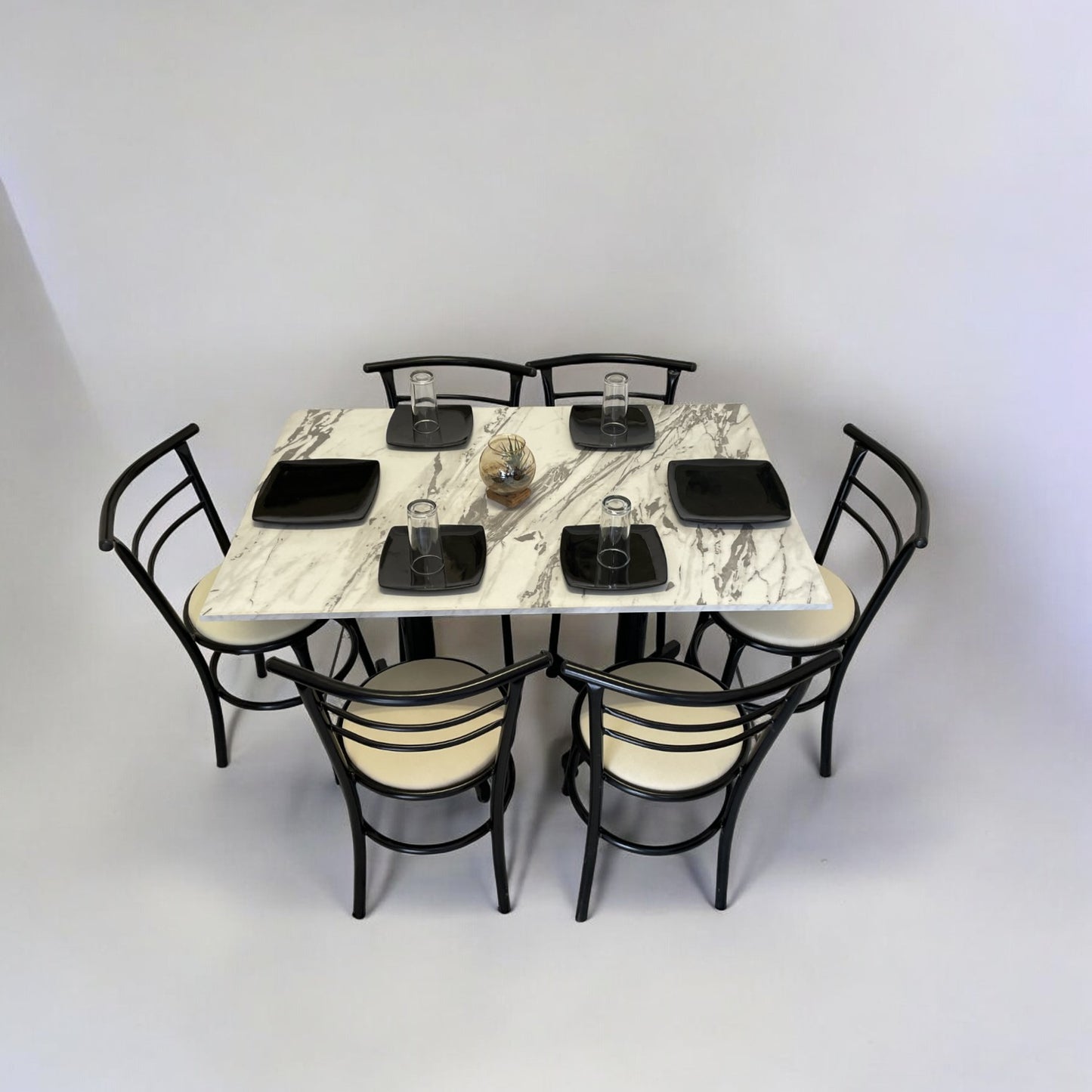 Mesa para restaurante Melanove con sillas Chabely